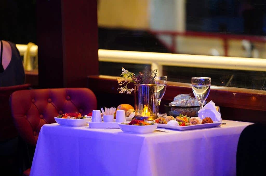 PRIVATE WINDOW SIDE CLOSE TO STAGE TABLE WITH HOTEL PICK UP AND WITH UNLIMITED ALCOHOL